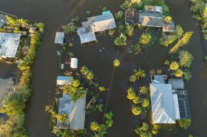 Surrounded by hurricane Ian rainfall flood waters homes in Florida residential area. Aftermath of natural disaster
